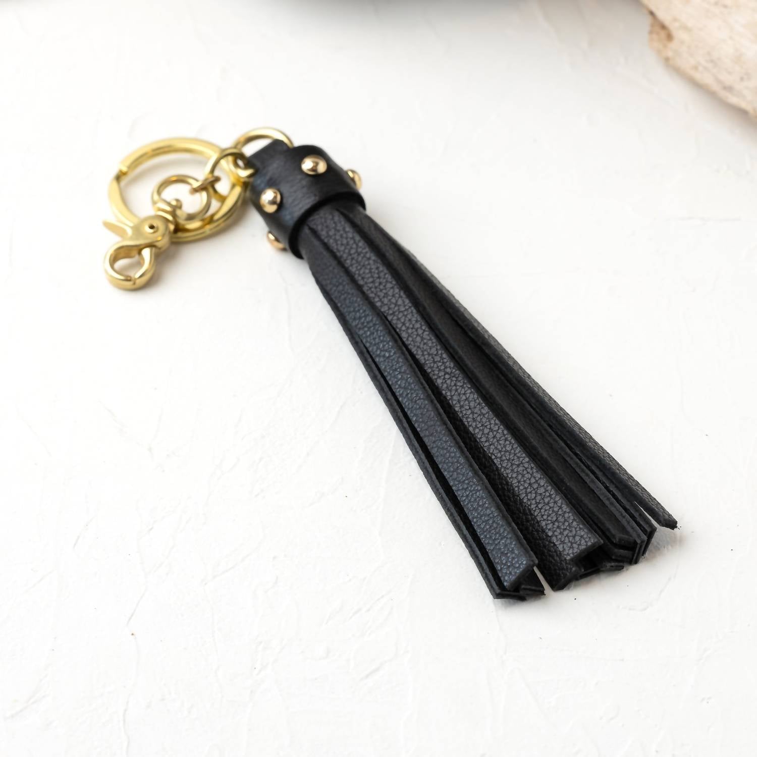 Nat Brass Tassel Key Chain In Black Licorice